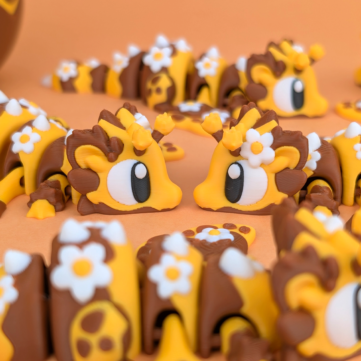 Honey Bee Dragon with matching egg - 3D printed articulated dragon in yellow and brown with daisy detailing