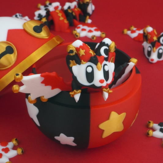 Jester Dragon with matching egg - 3D printed articulated dragon in red, black and gold with harlequin detailing