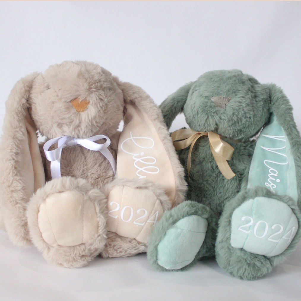 Personalised plush Easter bunny with custom name and year on ears and feet - soft keepsake Easter gift for kids.